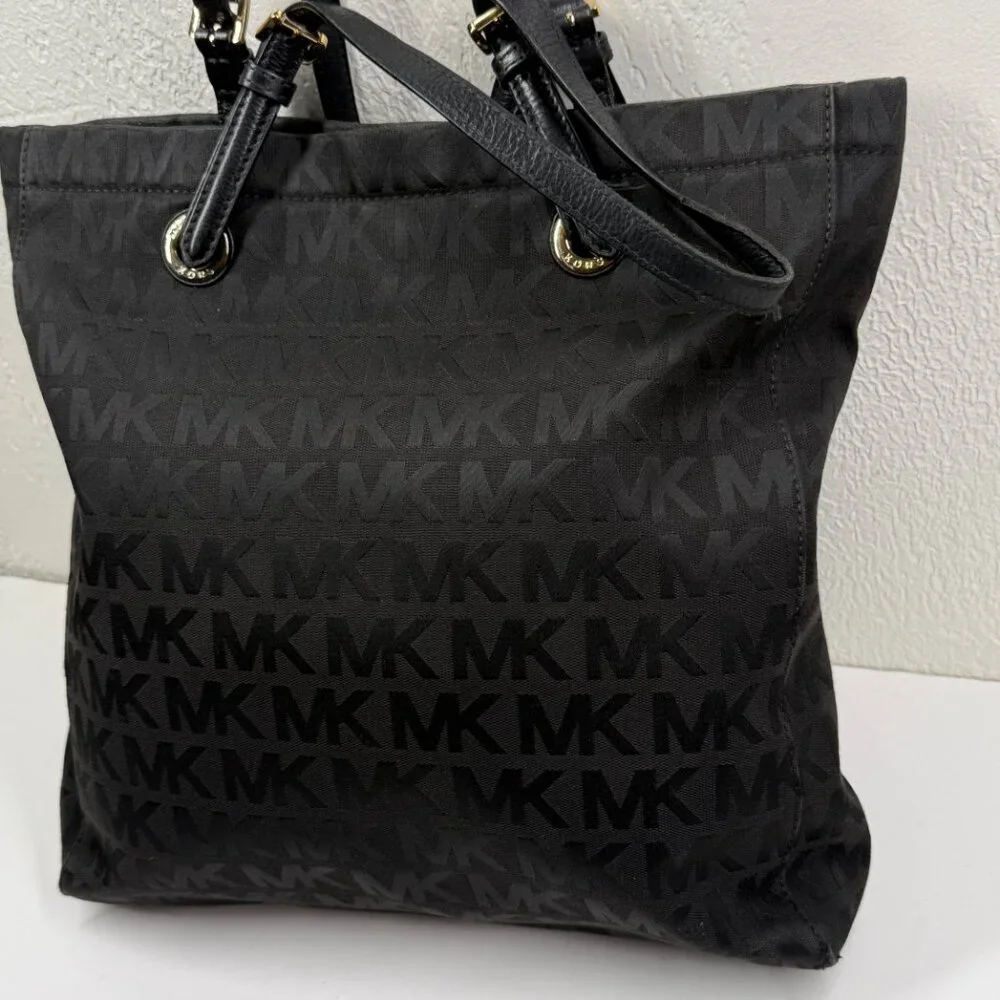 MICHAEL Michael Kors Jet Set Tote Black Monogram Nylon with Leather Straps